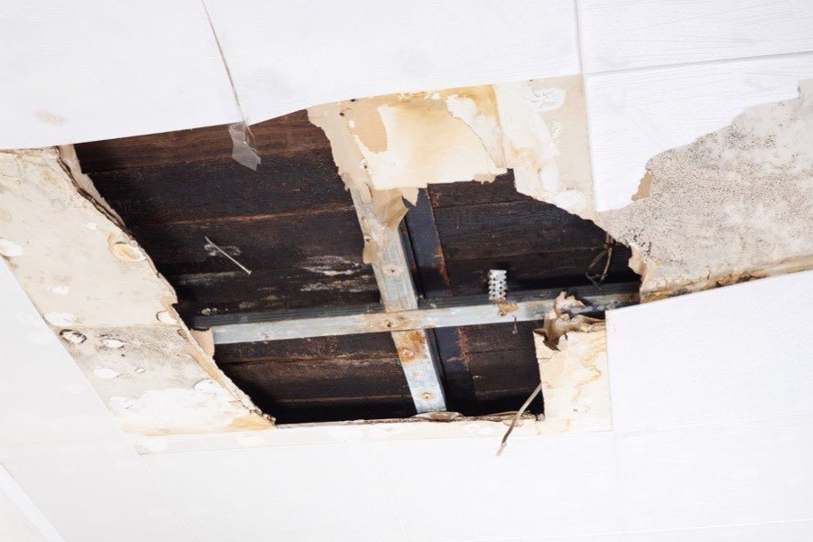 Ceiling opened up to reach a burst pipe running above the drywall